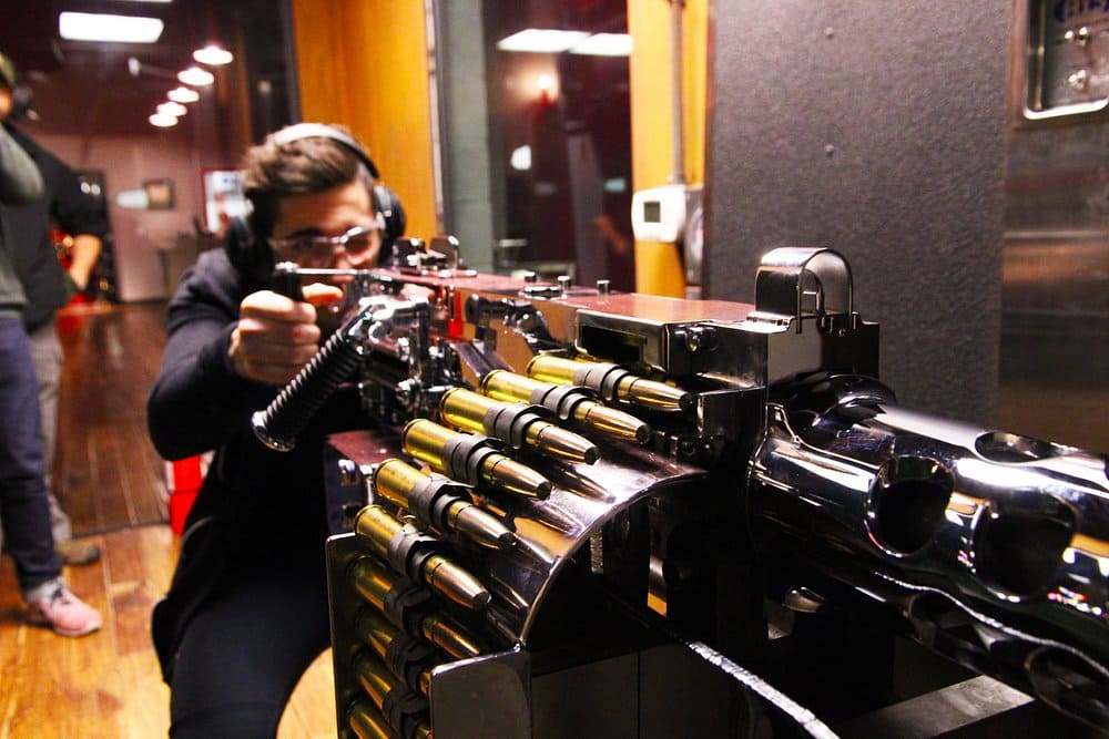shooting a 50 cal belt fed machine gun